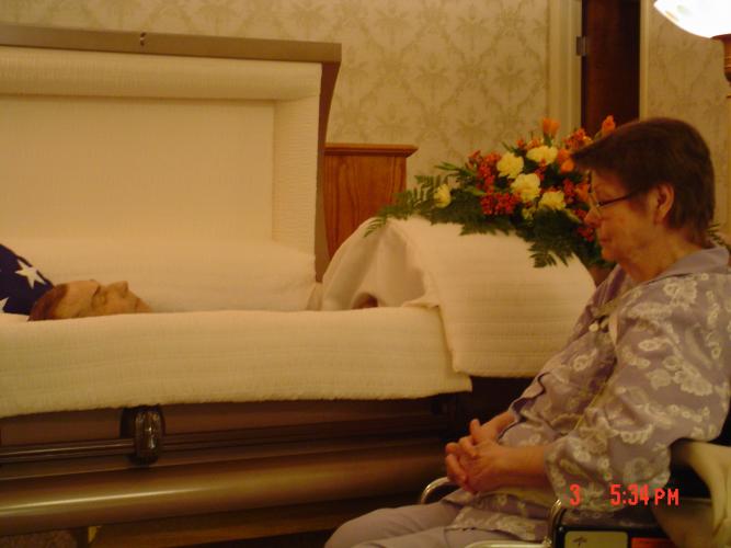 Our Grandmother telling our Grandfather Goodbye